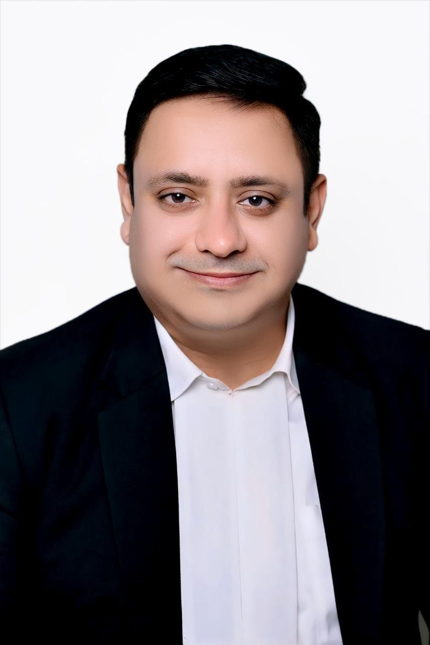 Adv. Vikram Tandon